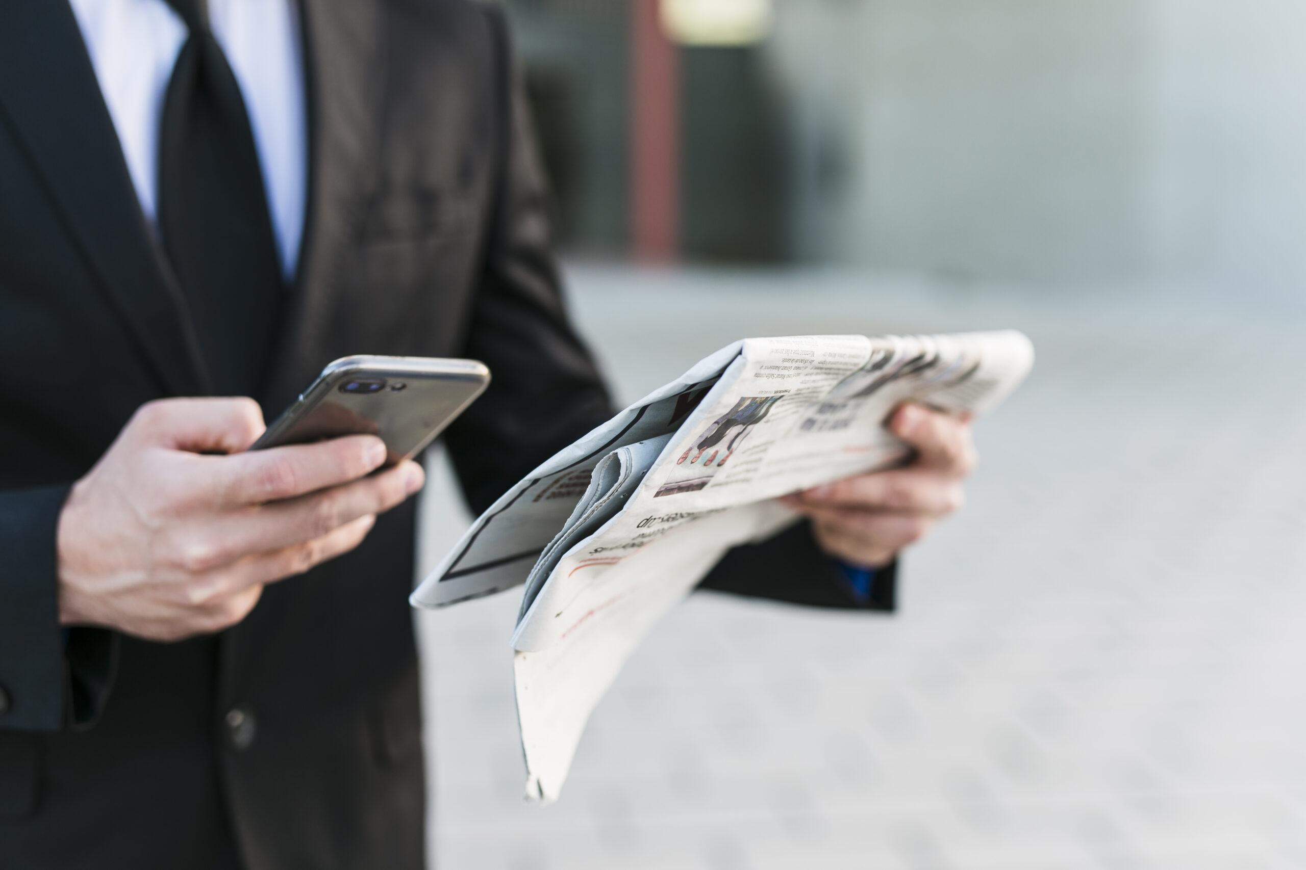 business-man-using-his-mobile-phone